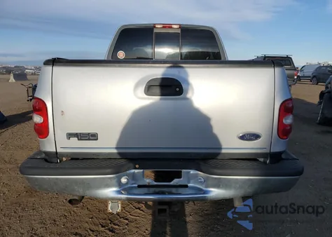 1999 Ford F150 z USA, uszkodzony, nr VIN 1FTRX08L3XKA96271